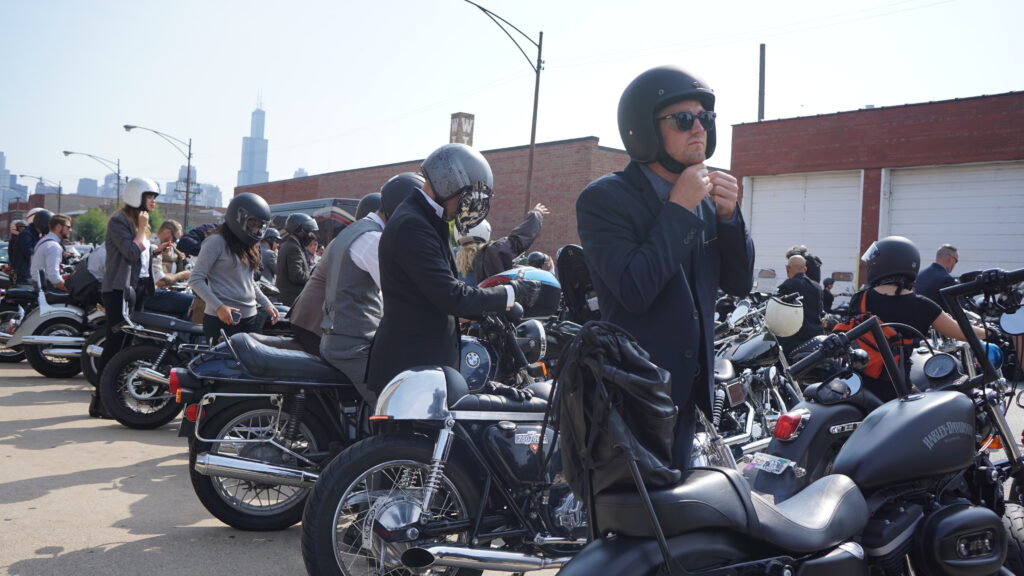 Riders dressed in their "Sunday's Best" getting ready to embark on the Distinguished Gentleman's Ride